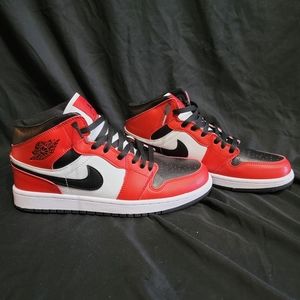 Mid Air Jordan 1s